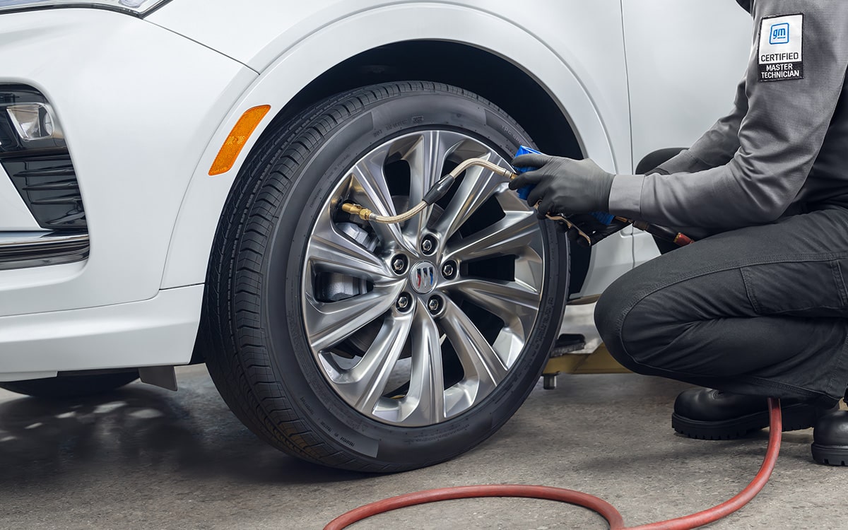 A Buick Certified Service Technician Inspecting Wipers