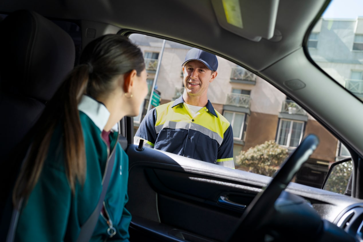 Mechanic Talking with Driver