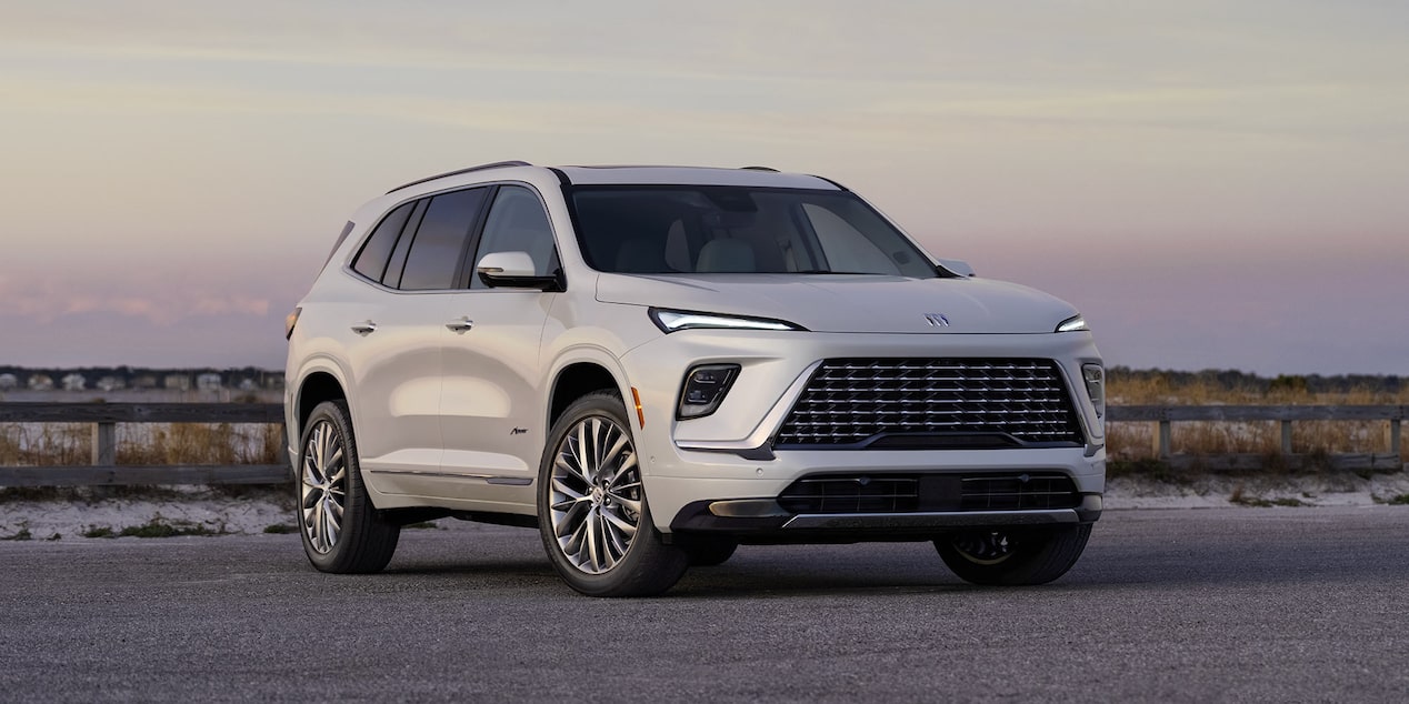 Front Three-Quarters View of a 2025 Buick Enclave Mid-Size SUV at Sunset