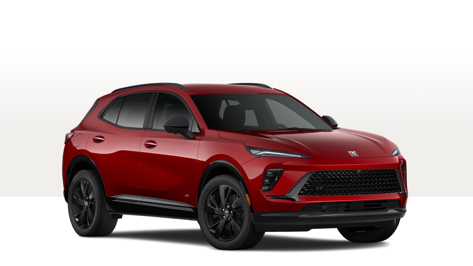 A Red Buick Envision ST Sporty Compact SUV With Black Wheels and an ST Badge on the Grille