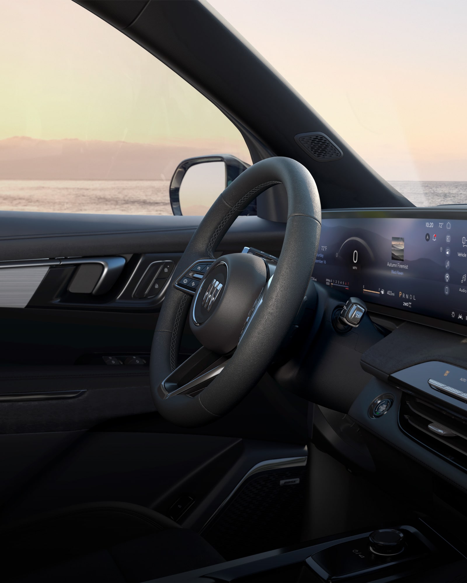 Interior View of the Steering Wheel and Dashboard from the Passenger Side View in the 2026 Buick Enclave Mid-Size SUV
