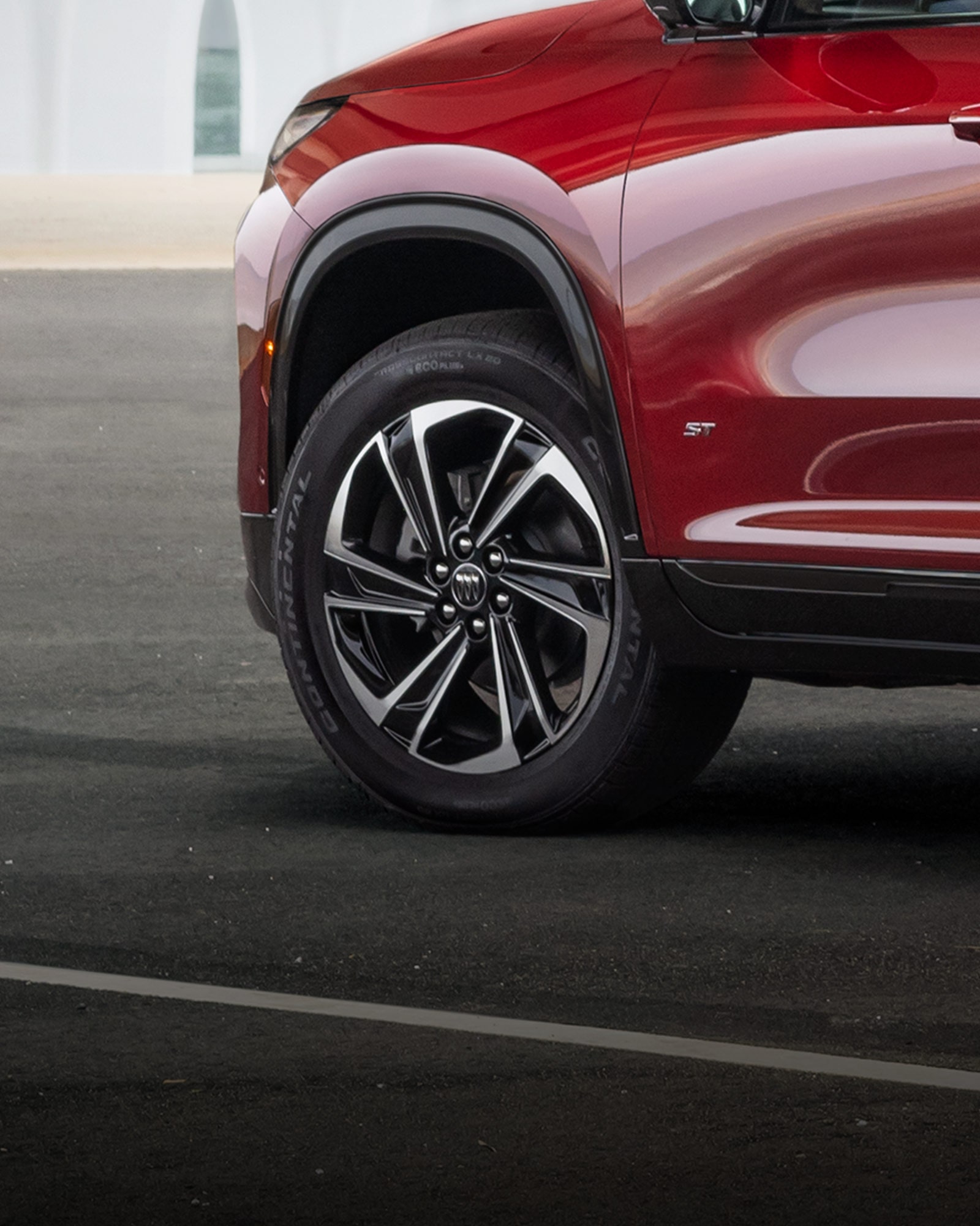 Close-up View of a Red Buick 2026 Enclave Front Tire