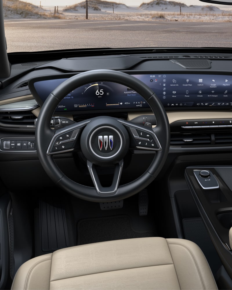 Close-up of the Buick Enclave Interior Drivers Side View of the Steering Wheel and Dashboard